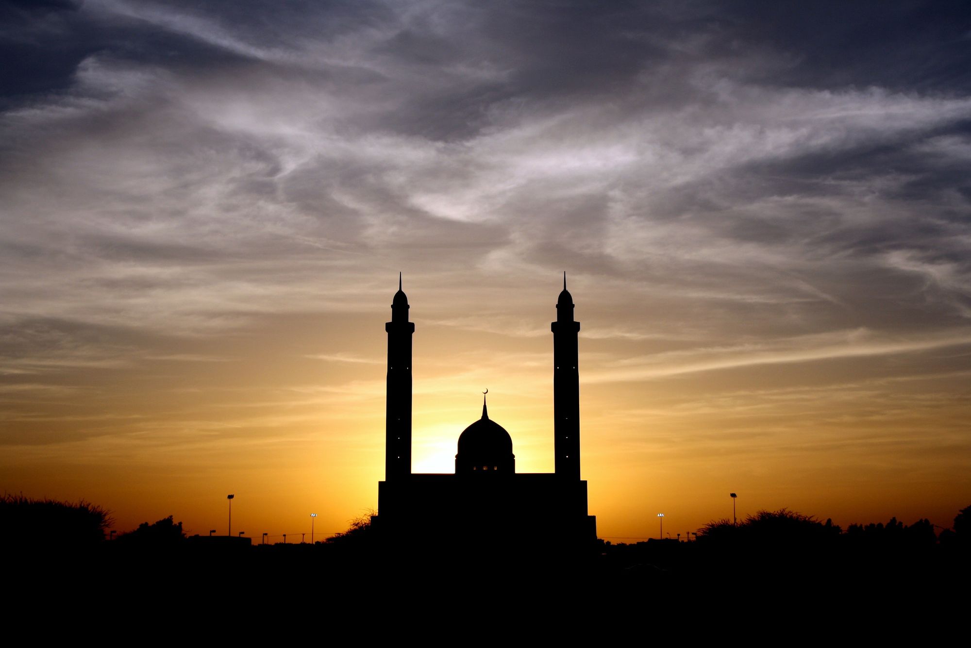 Muslim mosque with dome and minarets